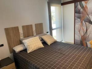 Postel nebo postele na pokoji v ubytování Villa en Oropesa
