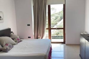 Postel nebo postele na pokoji v ubytování Villa en Oropesa