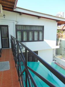 a balcony of a house with a swimming pool at Horton Studios in Colombo