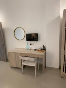 TV a/nebo společenská místnost v ubytování Hotel Oviya