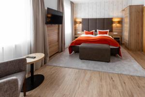 Postel nebo postele na pokoji v ubytování Hotel Fröhlich-Höche