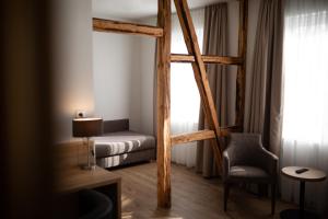Postel nebo postele na pokoji v ubytování Hotel Fröhlich-Höche