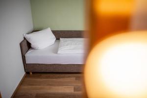 Postel nebo postele na pokoji v ubytování Hotel Fröhlich-Höche