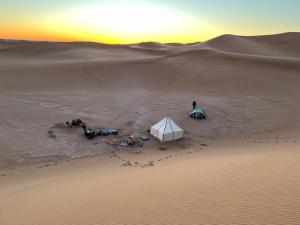 an aerial view of a tent in the desert at Mhamid Tours in Mhamid
