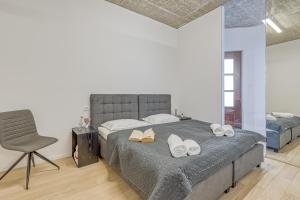 Postel nebo postele na pokoji v ubytování City Apartment Flow Ljubljana - Happy Rentals