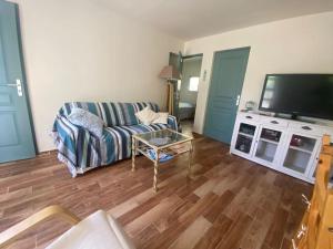 Kuchyňa alebo kuchynka v ubytovaní A l'ombre du figuier ! Maisonnette jardin / parking / proche mer