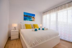 Postel nebo postele na pokoji v ubytování Ideal Property Mallorca - Primavera + 15 fotografií