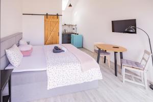 Postel nebo postele na pokoji v ubytování Babyky apartmány
