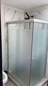 a glass shower in a bathroom with a toilet at SaVilie 1 - Seguridad y Comfort in Guadalajara