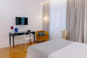 Televízia a/alebo spoločenská miestnosť v ubytovaní ViandanteHome, Luxury Rooms
