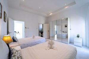 Voodi või voodid majutusasutuse Modern Large 2 Bedroom Pool Villa PV2 toas +48 fotot