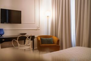 Televízia a/alebo spoločenská miestnosť v ubytovaní ViandanteHome, Luxury Rooms