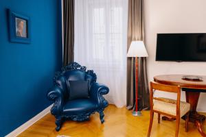 Televízia a/alebo spoločenská miestnosť v ubytovaní ViandanteHome, Luxury Rooms