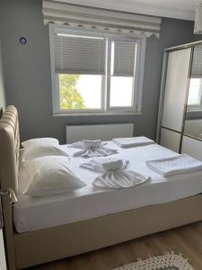 Postel nebo postele na pokoji v ubytování Traum Wohnung auf der Insel