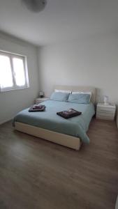 Postel nebo postele na pokoji v ubytování Sweet Riva Home