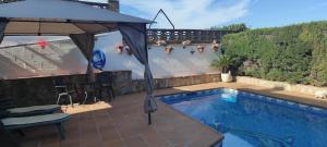 The swimming pool at or close to a18' de Barcelona y 10' de circuito de Cataluña
