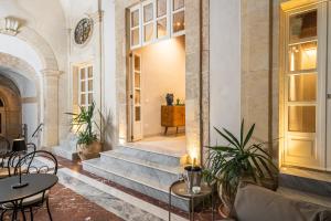 A seating area at Loggiato Verga Luxury by Bed&Bros