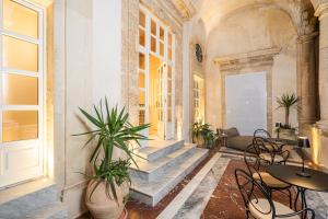 A seating area at Loggiato Verga Luxury by Bed&Bros