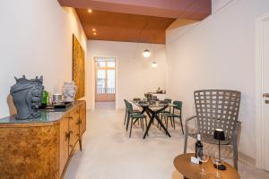 A seating area at Loggiato Verga Luxury by Bed&Bros