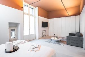 A seating area at Loggiato Verga Luxury by Bed&Bros