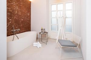 A bathroom at Loggiato Verga Luxury by Bed&Bros