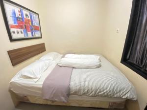 Gallery image of De Homestay Mitra RedDoorz Bitung in Bitung