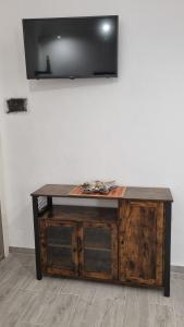 A television and/or entertainment centre at La piccola Perla