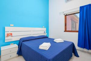 Postel nebo postele na pokoji v ubytování Casa Salina Bamba