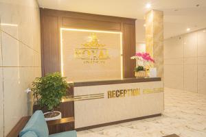 a lobby of a hotel with a reception desk at Royal Hotel & Apartment in Hanoi