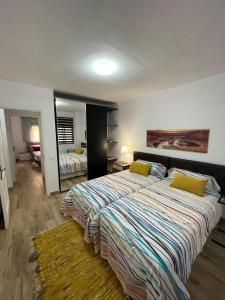 A bed or beds in a room at Buenavista Home