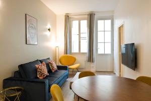 O zonă de relaxare la Pick A Flat's Apartment near Montmartre - Rue de Navarin