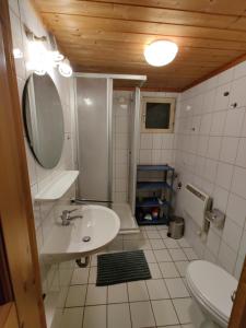 a bathroom with a sink and a toilet at Casita in Userin