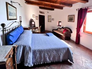 a bedroom with a bed and a couch at Aeneas' Landing Resort in Gaeta +141 photos