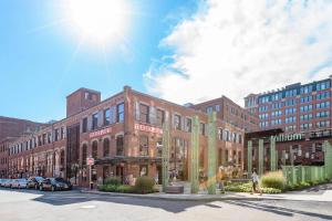 a rendering of a building on a city street at Luxury Fort Point 1BR w WD Gym BOS-488 in Boston