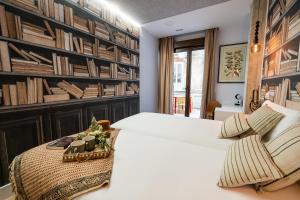 Center Suite Acebedos客房内的一张或多张床位