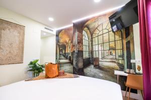 Center Suite Acebedos客房内的一张或多张床位