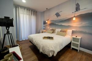 Center Suite Acebedos客房内的一张或多张床位