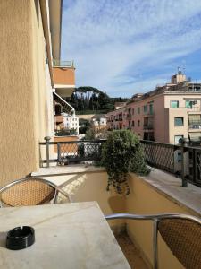 A balcony or terrace at Vatican Walls Apartment