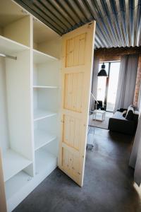 Postel nebo postele na pokoji v ubytování Smaltovňa Lofty