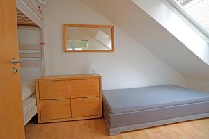 Postel nebo postele na pokoji v ubytování Dünenresidenz mit Meerblick