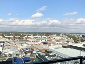 arial view of a city with buildings and roofs at M-city Apartment - Executive Twin King Ensuites - Fully equipped - Free Parking, fast Wifi, smart TV, Netflix, complementary drinks & amenities - M-city shopping centre Clayton 3168 in Clayton North