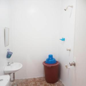 Koupelna v ubytování Scott Camotes Beach House