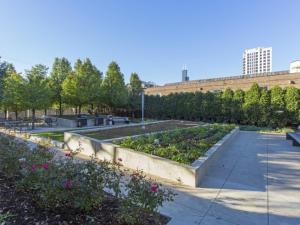 a garden with flowers and plants in a park at S Loop 1BR w Gym Lounge 1 block to L CHI-526 in Chicago
