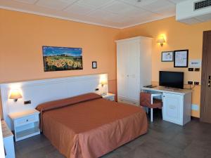 Postel nebo postele na pokoji v ubytování Hotel Azalea + 37 fotografií