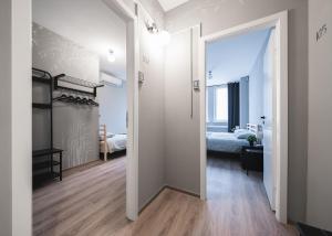 Postel nebo postele na pokoji v ubytování Lollo Motel Graičiūno - Lollo Luxury