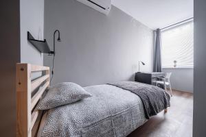 Postel nebo postele na pokoji v ubytování Lollo Motel Graičiūno - Lollo Luxury