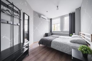 Postel nebo postele na pokoji v ubytování Lollo Motel Graičiūno - Lollo Luxury