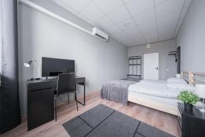 Postel nebo postele na pokoji v ubytování Lollo Motel Graičiūno - Lollo Luxury