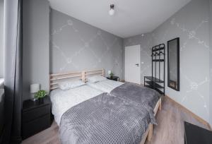 Postel nebo postele na pokoji v ubytování Lollo Motel Graičiūno - Lollo Luxury