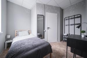 Postel nebo postele na pokoji v ubytování Lollo Motel Graičiūno - Lollo Luxury